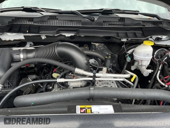 2023 Ram 1500 Tradesman with VIN 1C6RR7FT4PS588854, listed as a Copart auction lot 64556685 with 24,403 mi miles and Salvage title. Bid and sale history available at DreamBid. Image 7.