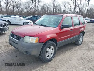 2004 Ford Escape XLS with VIN 1FMYU92184KA62415, listed as a IAAI auction lot 41648537 with 232,781 mi miles and . Bid and sale history available at DreamBid. Image 2.