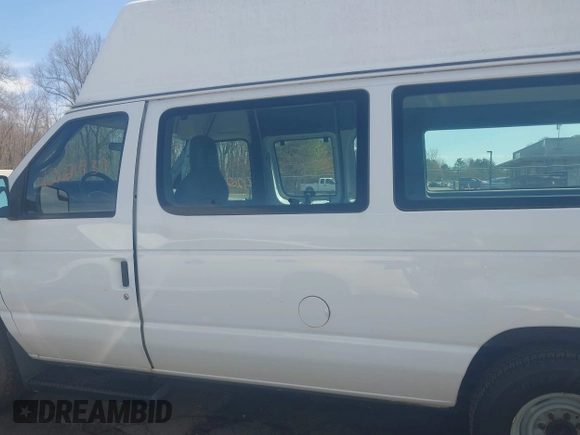 2014 Ford Econoline Cargo Commercial with VIN 1FTNS2EW7EDA67834, listed as a IAAI auction lot 42026939 with 138,501 mi miles. Bid and sale history available at carsss.com. Image 14.