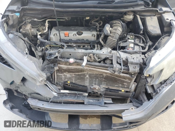 2013 Honda CR-V EX-L z VIN 2HKRM4H72DH644399, wystawiony jako Copart lot #57023265 z przebiegiem 206 344 mil mil oraz Szkoda całkowita • Salvage title. Historia ofert i sprzedaży dostępna na DreamBid. Obrazek 12.