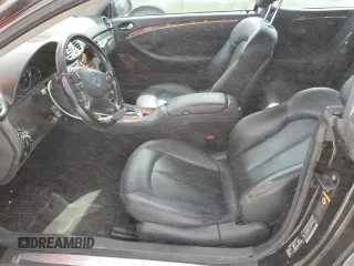 2004 Mercedes-Benz CLK 500 with VIN WDBTK75G04T005692, listed as a Copart auction lot 77038514 with 125,997 mi miles and Salvage Title. Bid and sale history available at DreamBid. Image 7.