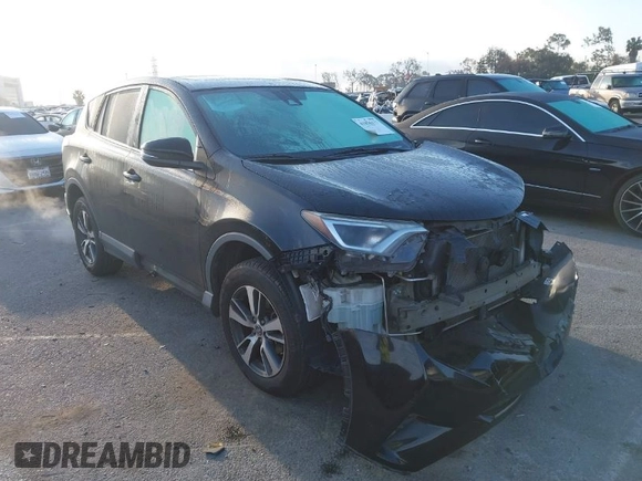 2018 Toyota RAV4 XLE with VIN 2T3WFREV2JW483635, listed as a IAAI auction lot 41856177 with 94,710 mi miles. Bid and sale history available at carsss.com. Image 1.