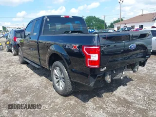 2018 Ford F-150 XL with VIN 1FTEX1EP5JKG01004, listed as a IAAI auction lot 42583232 with 123,258 mi miles and . Bid and sale history available at DreamBid. Image 3.