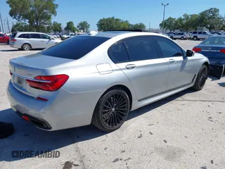 2016 BMW 7 Series 750i xDrive with VIN WBA7F2C52GG417733, listed as a IAAI auction lot 42040625 with 91,007 mi miles. Bid and sale history available at carsss.com. Image 4.