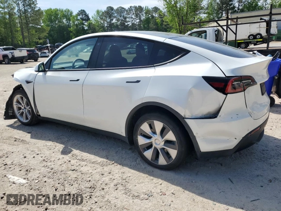 2020 Tesla Model Y Long Range z VIN 5YJYGDEEXLF043910, wystawiony jako Copart lot #54007745 z przebiegiem 102 974 mil mil oraz Szkoda całkowita • Salvage title. Historia ofert i sprzedaży dostępna na DreamBid. Obrazek 2.