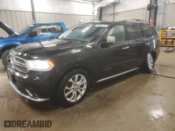 2018 Dodge Durango Citadel Anodized Platinum with VIN 1C4RDJEGXJC182877, listed as a Copart auction lot 83068134 with 84,545 mi miles and Salvage title. Bid and sale history available at DreamBid. Image 1.
