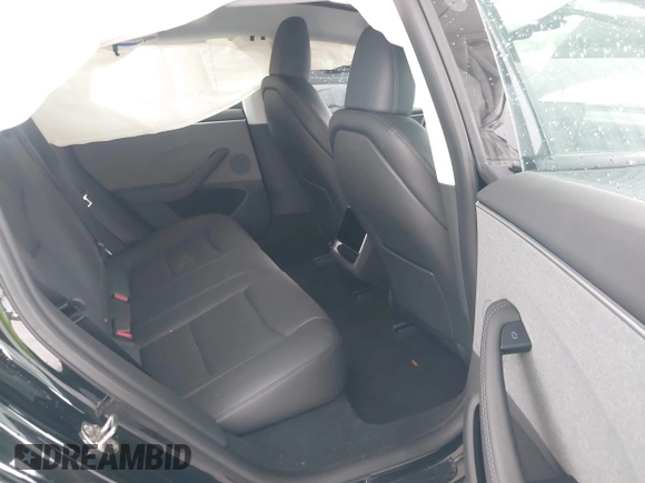 2024 Tesla Model 3 with VIN 5YJ3E1EA6RF731312, listed as a IAAI auction lot 41987407 with 5,025 mi miles and . Bid and sale history available at DreamBid. Image 8.