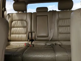 2002 Lexus LX 470 z VIN JTJHT00W423522126, wystawiony jako Copart lot #56582855 z przebiegiem 280 679 mil mil oraz Szkoda całkowita • Salvage title. Historia ofert i sprzedaży dostępna na DreamBid. Obrazek 10.