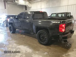 2017 Chevrolet Silverado 1500 LT with VIN 3GCUKREC8HG143224, listed as a Copart auction lot 87178744 with 136,297 mi miles and Salvage Title. Bid and sale history available at DreamBid. Image 2.