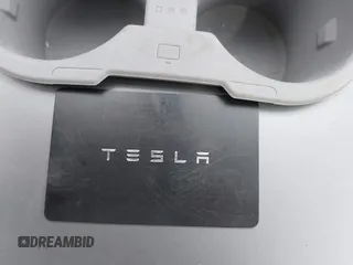 2023 Tesla Model Y Long Range with VIN 7SAYGAEEXPF776370, listed as a IAAI auction lot 42127512 with 27,120 mi miles and . Bid and sale history available at DreamBid. Image 11.