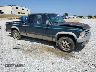 1995 Dodge Dakota with VIN 1B7GL23Y9SS177365, listed as a Copart auction lot 68956734 with 210,499 mi miles and Salvage Title. Bid and sale history available at carsss.com. Image 4.