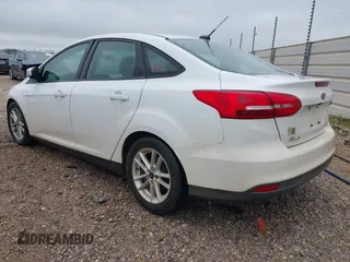 2018 Ford Focus SE z VIN 1FADP3F23JL225333, wystawiony jako IAAI lot #41758445 z przebiegiem 133 307 mil mil oraz . Historia ofert i sprzedaży dostępna na DreamBid. Obrazek 3.