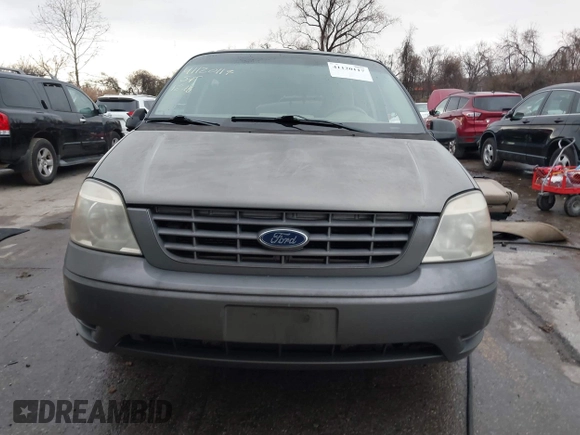 2005 Ford Freestar SE z VIN 2FMZA51625BA54311, wystawiony jako IAAI lot #41120117 z przebiegiem 139 647 mil mil oraz . Historia ofert i sprzedaży dostępna na DreamBid. Obrazek 13.