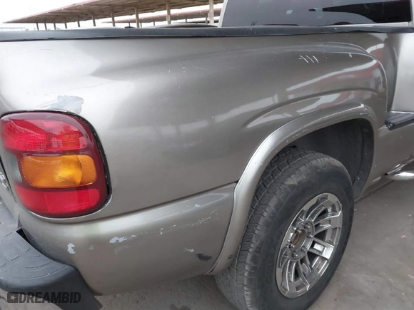 2003 GMC Sierra 1500 SLT with VIN 1GTEC19TX3Z212534, listed as a IAAI auction lot 41591390 with 158,457 mi miles. Bid and sale history available at carsss.com. Image 12.