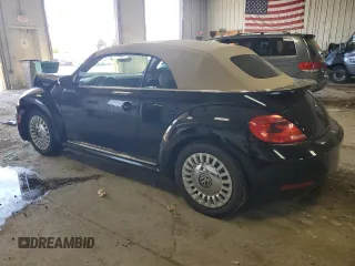 2013 Volkswagen Beetle 2.5L с VIN 3VW5P7AT5DM811974, выставлен на аукционе Copart как лот 56853015 с пробегом 68 959 миль миль и На запчасти • Non repairable. История ставок и продаж доступна на DreamBid. Изображение 2.