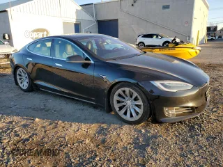 2019 Tesla Model S 75D with VIN 5YJSA1E23KF330239, listed as a Copart auction lot 86737544 with Not provided miles and Salvage title. Bid and sale history available at DreamBid. Image 4.