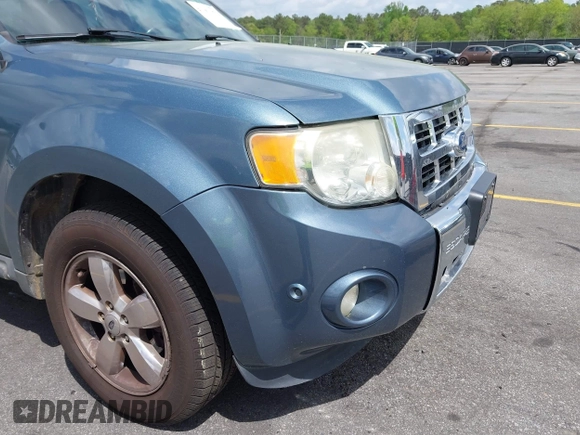 2011 Ford Escape Limited with VIN 1FMCU0E78BKB28559, listed as a IAAI auction lot 41951972 with 213,913 mi miles. Bid and sale history available at carsss.com. Image 12.