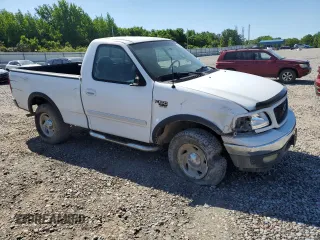 2001 Ford F-150 XL with VIN 1FTRF18L41NB60977, listed as a Copart auction lot 54933785 with 238,700 mi miles and Salvage title. Bid and sale history available at DreamBid. Image 4.