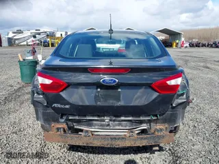 2014 Ford Focus S with VIN 1FADP3E29EL176811, listed as a IAAI auction lot 41808719 with 84,600 mi miles. Bid and sale history available at carsss.com. Image 17.