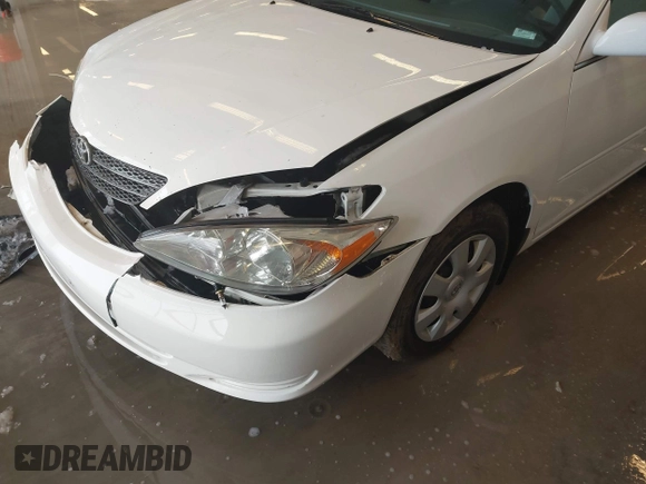 2004 Toyota Camry LE with VIN 4T1BE32K64U339432, listed as a IAAI auction lot 41622306 with 116,442 mi miles. Bid and sale history available at carsss.com. Image 18.