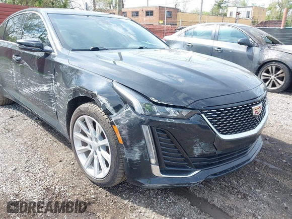 2021 Cadillac CT5 Luxury z VIN 1G6DX5RKXM0146235, wystawiony jako IAAI lot #42214676 z przebiegiem 72 847 mil mil oraz . Historia ofert i sprzedaży dostępna na DreamBid. Obrazek 20.
