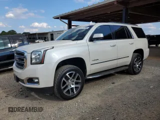 2015 GMC Yukon SLT with VIN 1GKS2BKC1FR736203, listed as a Copart auction lot 67977694 with 178,781 mi miles and Salvage Title. Bid and sale history available at carsss.com. Image 1.