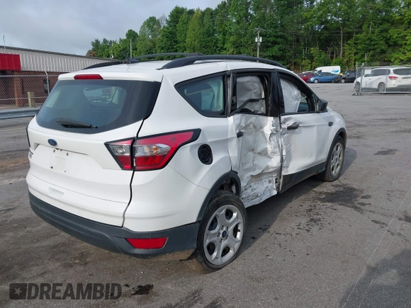 2018 Ford Escape S with VIN 1FMCU0F75JUC89890, listed as a IAAI auction lot 42475253 with 104,500 mi miles and . Bid and sale history available at DreamBid. Image 4.