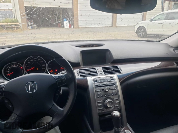 2011 Acura RL Technology with VIN JH4KB2F61BC000552, listed as a Copart auction lot 76321544 with 156,487 mi miles and Salvage Title. Bid and sale history available at DreamBid. Image 9.