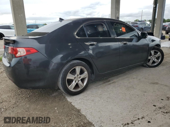 2012 Acura TSX с VIN JH4CU2F47CC007987, выставлен на аукционе Copart как лот 59218385 с пробегом Не указан миль и Списание • Salvage title. История ставок и продаж доступна на DreamBid. Изображение 3.