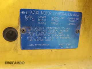 2003 Suzuki Aerio SX z VIN JS2RC41H435203206, wystawiony jako Copart lot #79682674 z przebiegiem 171 435 mil mil oraz Szkody całkowita. Historia ofert i sprzedaży dostępna na DreamBid. Obrazek 14.