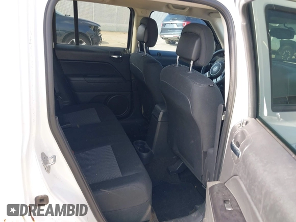 2014 Jeep Patriot Latitude with VIN 1C4NJPFA3ED618523, listed as a IAAI auction lot 41750625 with Not Provided miles and . Bid and sale history available at carsss.com. Image 8.