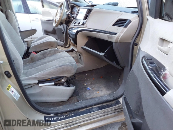 2012 Toyota Sienna with VIN 5TDKA3DC1CS011022, listed as a IAAI auction lot 41415386 with 209,552 mi miles and . Bid and sale history available at DreamBid. Image 5.