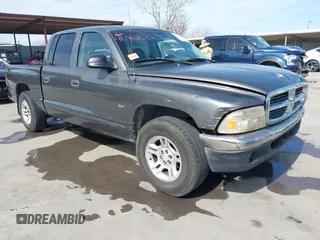 2001 Dodge Dakota z VIN 1B7HL2AX51S333575, wystawiony jako IAAI lot #41782582 z przebiegiem 291 640 mil mil oraz . Historia ofert i sprzedaży dostępna na DreamBid. Obrazek 1.