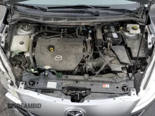 2012 Mazda 5 Touring with VIN JM1CW2CL8C0121599, listed as a Copart auction lot 50520895 with 131,948 mi miles and Salvage title. Bid and sale history available at DreamBid. Image 14.