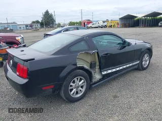 2007 Ford Mustang Deluxe with VIN 1ZVFT80N675258576, listed as a IAAI auction lot 42283829 with 56,334 mi miles and . Bid and sale history available at DreamBid. Image 4.