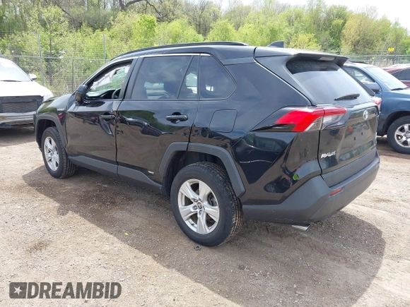 2021 Toyota RAV4 Hybrid LE with VIN 2T3L6RFV7MW011159, listed as a IAAI auction lot 42212998 with 104,626 mi miles and . Bid and sale history available at DreamBid. Image 3.
