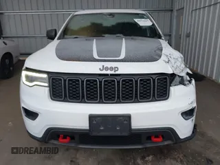 2018 Jeep Grand Cherokee Trailhawk with VIN 1C4RJFLGXJC264438, listed as a IAAI auction lot 40974417 with 117,717 mi miles and . Bid and sale history available at DreamBid. Image 12.