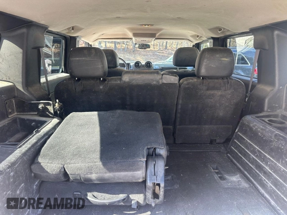 2007 Hummer H2 SUV z VIN 5GRGN23U47H100882, wystawiony jako Copart lot #53737005 z przebiegiem 197 351 mil mil oraz Czysty tytuł • Clean title. Historia ofert i sprzedaży dostępna na DreamBid. Obrazek 9.