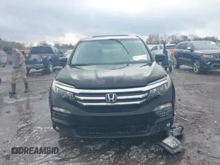 2016 Honda Pilot EX-L with VIN 5FNYF5H56GB031831, listed as a IAAI auction lot 41111342 with 244,197 mi miles and . Bid and sale history available at DreamBid. Image 12.