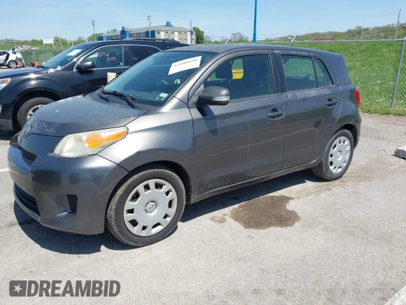 2008 Scion xD with VIN JTKKU10458J014660, listed as a IAAI auction lot 42100828 with 136,436 mi miles. Bid and sale history available at carsss.com. Image 2.