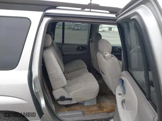 2005 Chevrolet TrailBlazer LS with VIN 1GNES16S956112497, listed as a IAAI auction lot 41486711 with 243,719 mi miles. Bid and sale history available at carsss.com. Image 8.