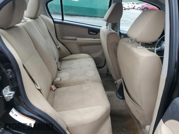2011 Suzuki SX4 LE z VIN JS2YC5A28B6300625, wystawiony jako Copart lot #54044155 z przebiegiem 179 269 mil mil oraz Szkoda całkowita • Salvage title. Historia ofert i sprzedaży dostępna na DreamBid. Obrazek 10.