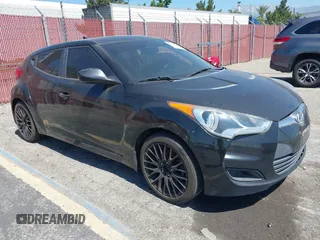 2013 Hyundai Veloster w/Black Int с VIN KMHTC6AD4DU151409, выставлен на аукционе IAAI как лот 42639582 с пробегом 283 208 миль миль и . История ставок и продаж доступна на DreamBid. Изображение 1.