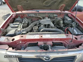 1998 Mazda B-Series Truck SX z VIN 4F4YR12C5WTM39439, wystawiony jako Copart lot #85689024 z przebiegiem 125 357 mil mil oraz Czysty tytuł • Clean title. Historia ofert i sprzedaży dostępna na DreamBid. Obrazek 11.