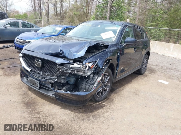 2018 Mazda CX-5 Grand Touring with VIN JM3KFBDM3J0377866, listed as a IAAI auction lot 41947014 with 70,446 mi miles. Bid and sale history available at carsss.com. Image 17.