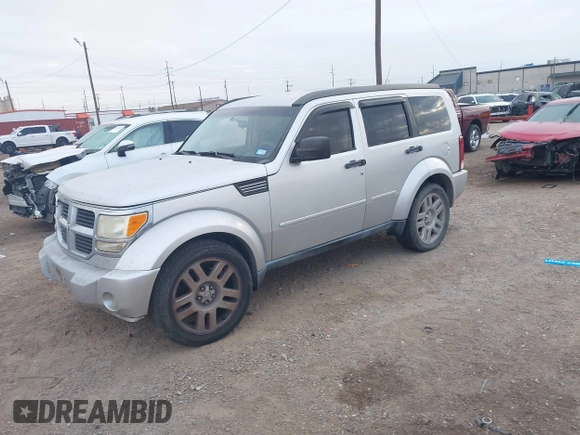 2010 Dodge Nitro SE with VIN 1D4PT2GK8AW144406, listed as a IAAI auction lot 41590691 with 165,959 mi miles and . Bid and sale history available at DreamBid. Image 2.