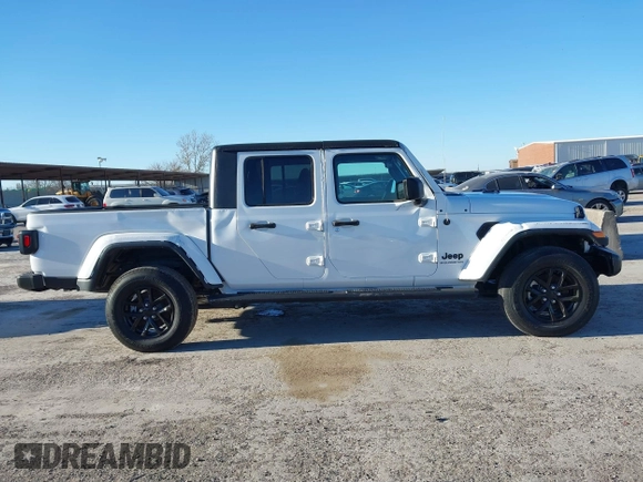 2023 Jeep Gladiator Willys z VIN 1C6HJTAGXPL528674, wystawiony jako IAAI lot #41376339 z przebiegiem 7 102 mil mil oraz . Historia ofert i sprzedaży dostępna na DreamBid. Obrazek 6.
