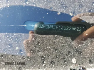 2018 Genesis G80 3.8L z VIN KMHGN4JE1JU226622, wystawiony jako Copart lot #54311945 z przebiegiem 52 742 mil mil oraz Szkody całkowita. Historia ofert i sprzedaży dostępna na DreamBid. Obrazek 13.