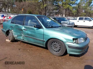 1996 Toyota Tercel DX z VIN JT2BC52L7T0143125, wystawiony jako IAAI lot #41401621 z przebiegiem 263 479 mil mil oraz . Historia ofert i sprzedaży dostępna na DreamBid. Obrazek 1.