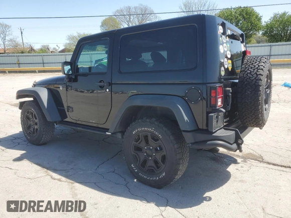 2013 Jeep Wrangler Sahara with VIN 1C4AJWBG8DL602065, listed as a Copart auction lot 52082535 with 110,727 mi miles and Salvage title. Bid and sale history available at DreamBid. Image 2.
